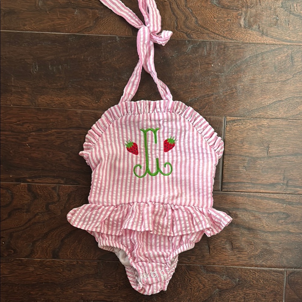 Pink Striped Baby Romper with “c” and Ruffles
